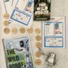 A table with books, magnets and a robot.